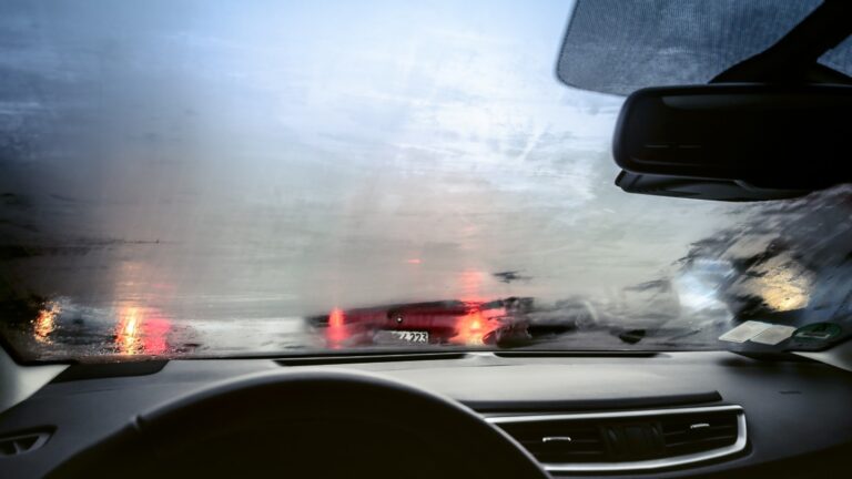 5 Cheap Tools That Make Cleaning The Inside Of Your Car's Windshield A Breeze