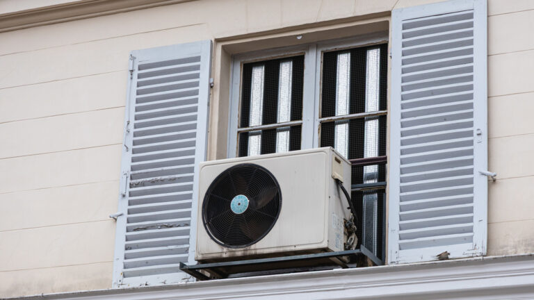 Here's Why Window AC Units Have To Actually Be Mounted To A Window To Work