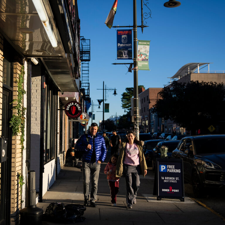 Far From Gaza, a Palestinian Enclave Thrives, Even as War Feels Near