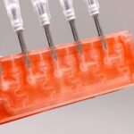 Printing an Air-Powered Integrated Circuit for Squishy Robots