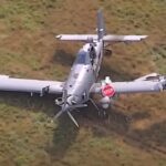 National Guard Plane Makes An Emergency Landing, Almost Takes Out A Tesla