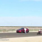 Tesla Drives Onto Live Race Track During Motorcycle Race, as Driver Nearly Kills People